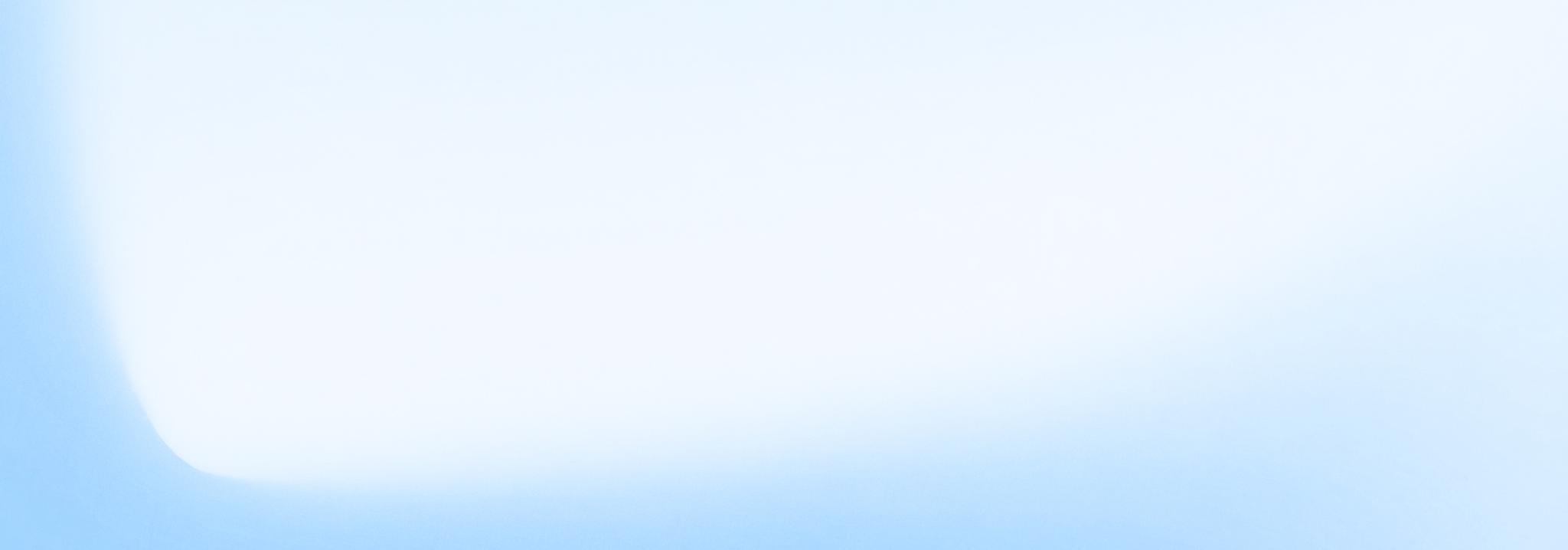 Plain pale blue gradient background brightening to near white in the middle